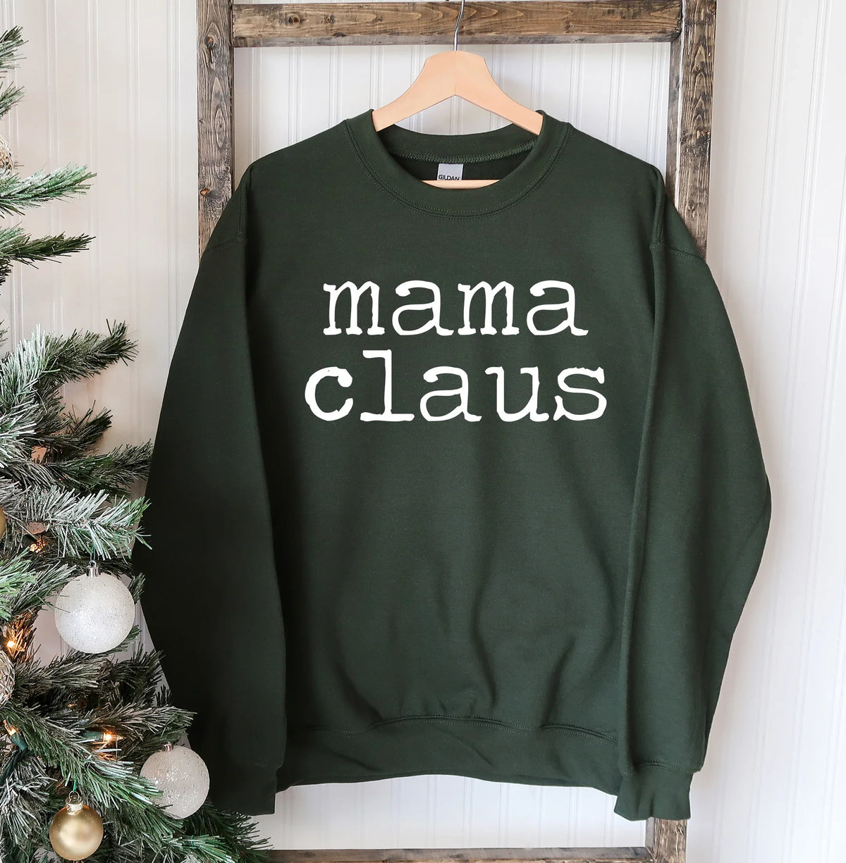 Side view of Mama Claus Christmas sweatshirt highlighting double-needle stitched hem and cuffs.