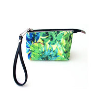 Red wristlet bag showing side profile with visible wrist strap on a plain white background.