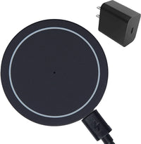 Close-up of magnetic wireless charger attached to back of an iPhone 13 in use.