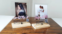 Close-up of personalized music plaque showing UV printed album cover and song information.