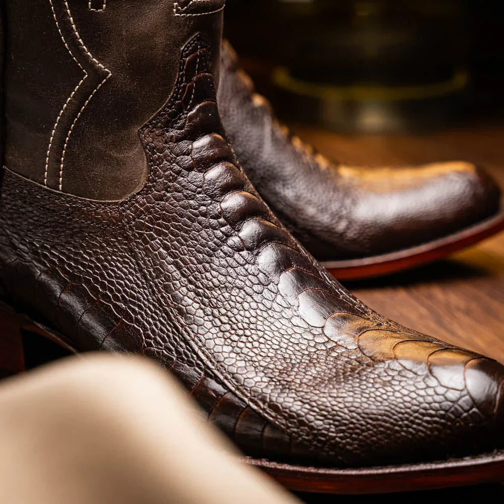 Side view of Denver brown cowboy boot highlighting ostrich leg leather and craftsmanship.
