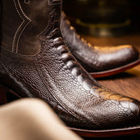 Side view of Denver brown cowboy boot highlighting ostrich leg leather and craftsmanship.