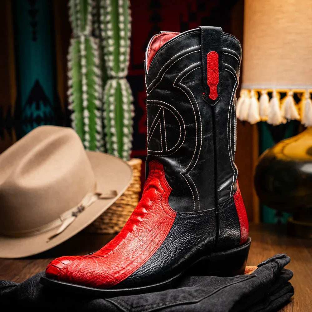 Denver red black ostrich leg boots with red stitching worn with blue jeans.