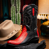 Denver red black ostrich leg boots with red stitching worn with blue jeans.