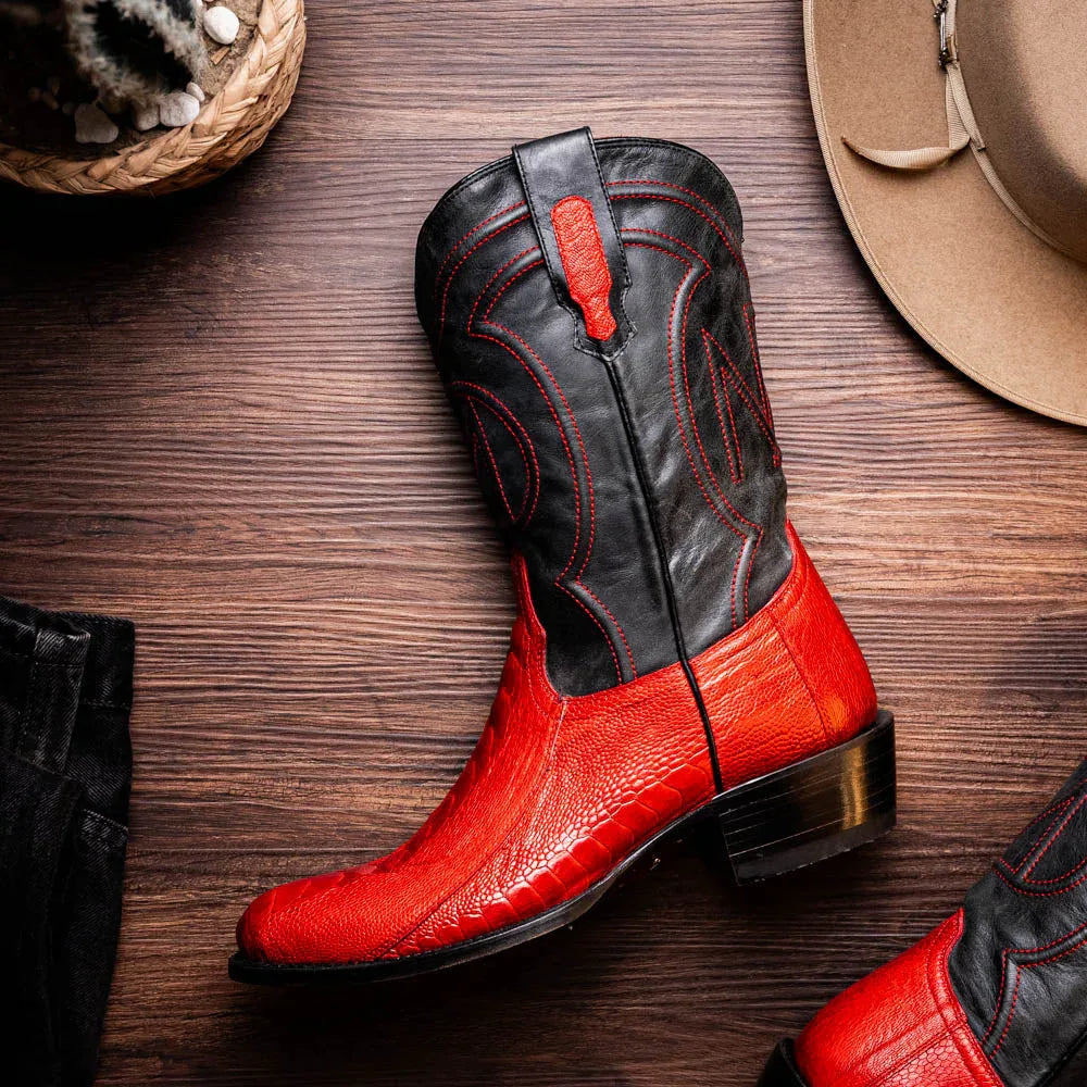 Denver Red boots worn outdoors, emphasizing contrast between red vamp and black full-grain leather.