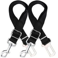 Two black adjustable dog seatbelt connectors with metal clips attached, designed for safe car travel with pets.