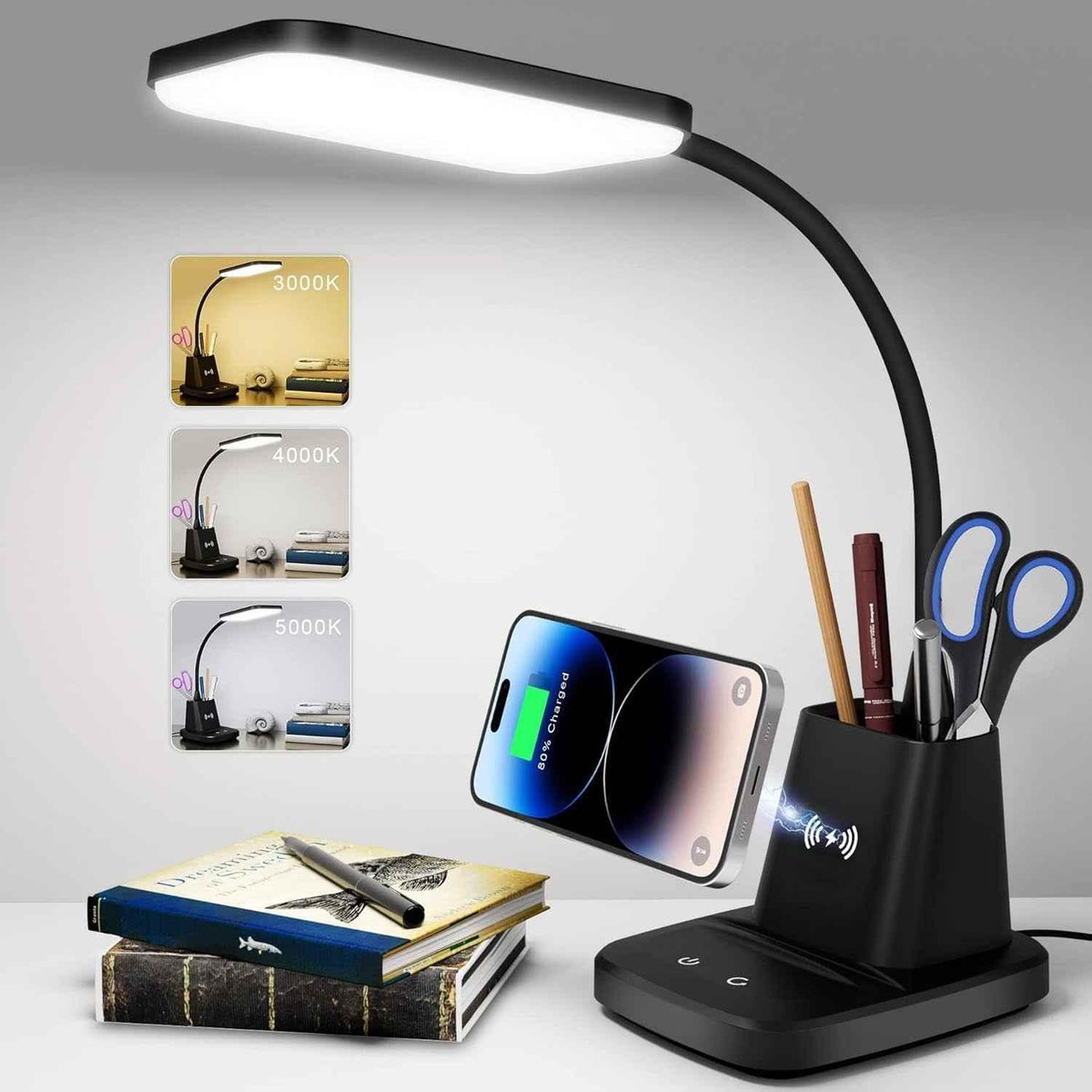 Black LED desk lamp with wireless charger and pen holder on a wooden office desk.