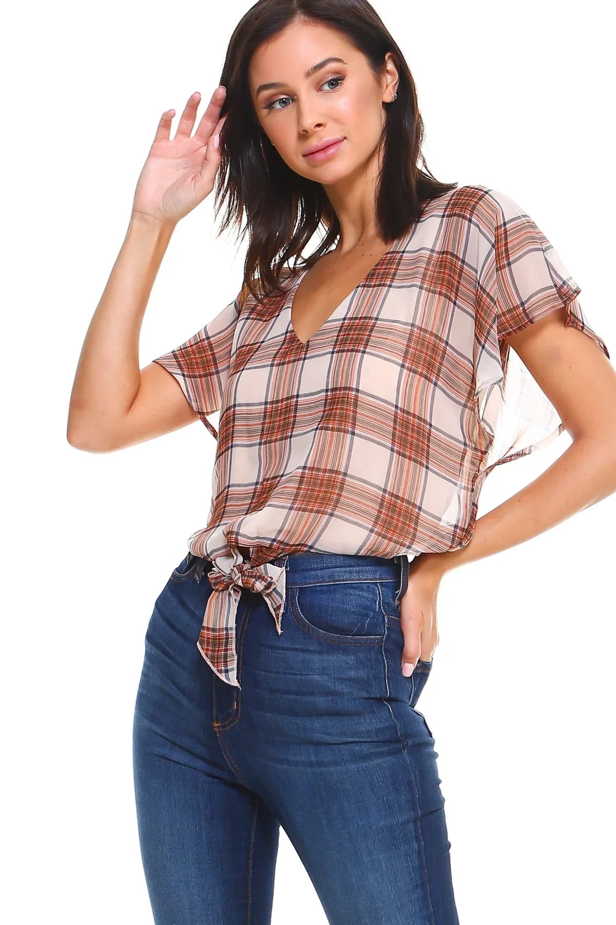 Front view of plaid V-neck tie-front blouse with flutter sleeves in soft fabric on white background.