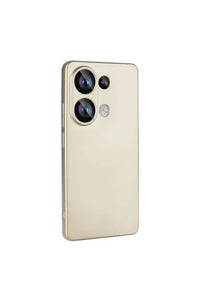 Gold silicone Xiaomi Poco M6 Pro 4G case displayed at an angle highlighting camera protection.
