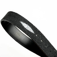Black stingray belt rolled to display texture and rich craftsmanship