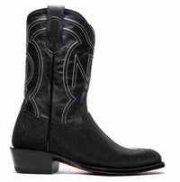 Close-up of shiny black stingray skin on the vamp of Georgia cowboy boot with contrast stitching detail.