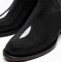 Detail of the full-grain leather shaft with subtle texture and red lining peeking from Georgia boot.