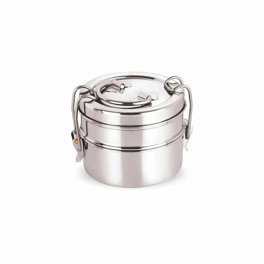 A compact two-tier stainless steel lunch box with secure lock clips, shown closed and ready for packing meals.