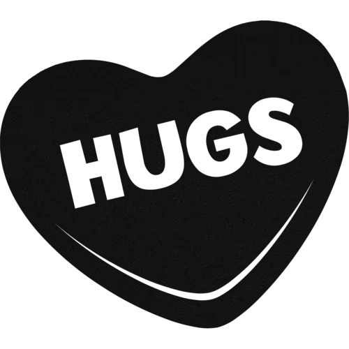 Black powder-coated Hugs Candy Heart metal wall art on dark wall background