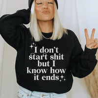 Black fleece sweatshirt with white text I Know How It Ends, small size, cozy fabric.