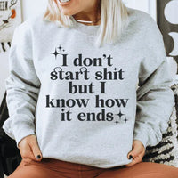 Sport grey fleece sweatshirt with white text I Know How It Ends, small size, soft material.