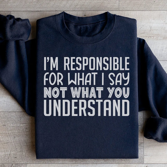 Black sweatshirt with white text reading 'I'm Responsible For What I Say Not What You Understand' in bold font.