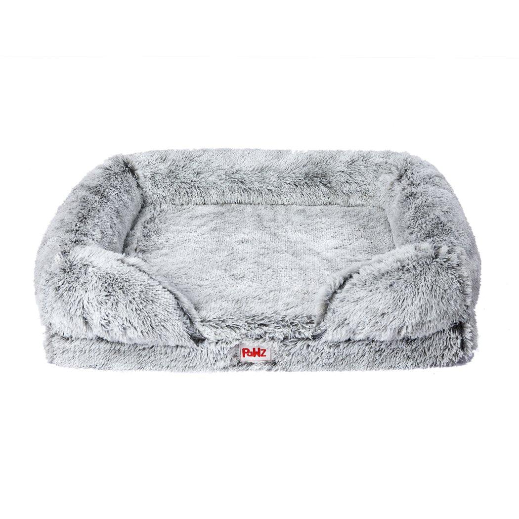 Close-up view of plush orthopedic pet bed showing soft memory foam filling and smooth texture