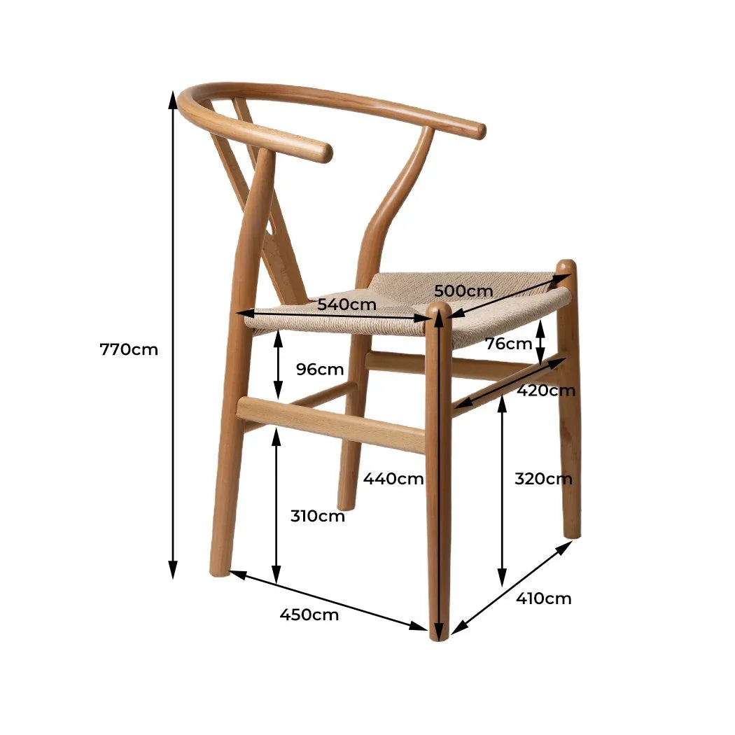Single wooden dining chair with rattan seat viewed from front on a plain backdrop.