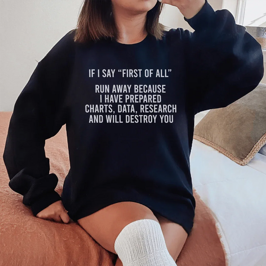 Black fleece sweatshirt with text 'If I Say First Of All Run Away' on front, displayed on white background.
