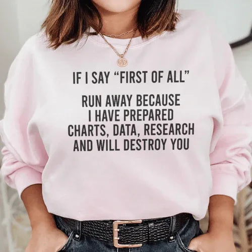 Light pink fleece sweatshirt with black text reading 'If I Say First Of All Run Away' on front.