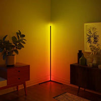 RGB LED corner floor lamp displaying bright vibrant colors, perfect for home ambiance.