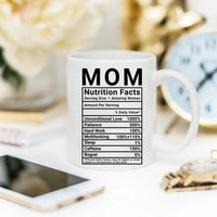 Side view of the 'Mom Nutrition Facts' coffee mug showing detailed funny ingredient text.