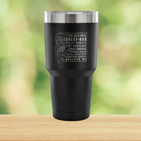 Close-up of tumbler showing Trump-themed laser etched design with stars and bold lettering.