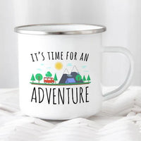 White enamel camping mug with black rim featuring adventure-themed design on both sides