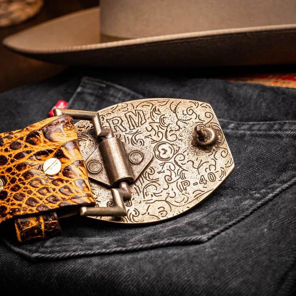 Outdoor lifestyle image focusing on the belt as part of a western casual look