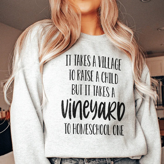 Sport grey sweatshirt with 'It Takes A Vineyard To Homeschool A Child' text in white and red script.