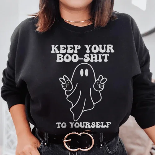 Black sweatshirt showing bold white text 'Keep Your Boo Shit To Yourself' on front.