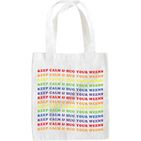 Close-up of Keep Calm Wiener Dog Tote bag with red handles and dog design on cream background.