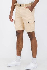 Close-up of khaki belted cargo shorts showing side cargo pocket and belt detail.