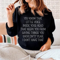 Black Little Voice sweatshirt shown from an angled view highlighting fleece texture and fit.