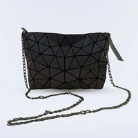 Top angle of the Lumination Holographic Purse displaying its color-shifting holographic material.