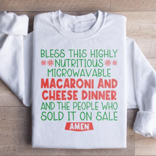White sweatshirt with playful macaroni and cheese dinner print on front.