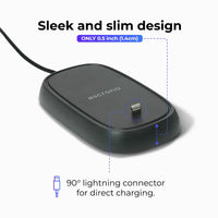 Dark grey Magic Mouse 2 charger with Lightning cable connected, displaying charging ready state.