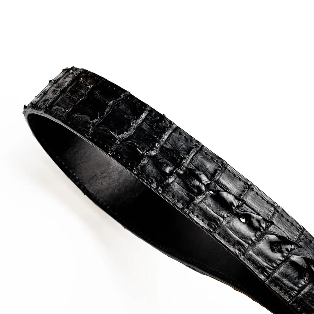 Close-up of Marlboro belt buckle with antique brass finish paired with textured hornback caiman leather.