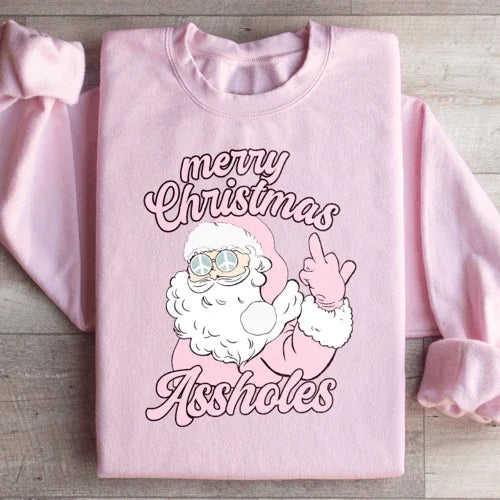 Light pink sweatshirt printed with 'Merry Christmas A sholes' in decorative lettering, small size