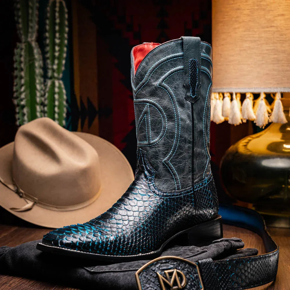 Casual scene featuring Missouri python skin cowboy boots with jeans outdoors.