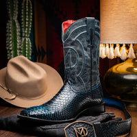 Casual scene featuring Missouri python skin cowboy boots with jeans outdoors.