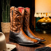 Missouri Lisboa python cowboy boot styled with casual Western outfit, highlighting boot’s bold design and craftsmanship.