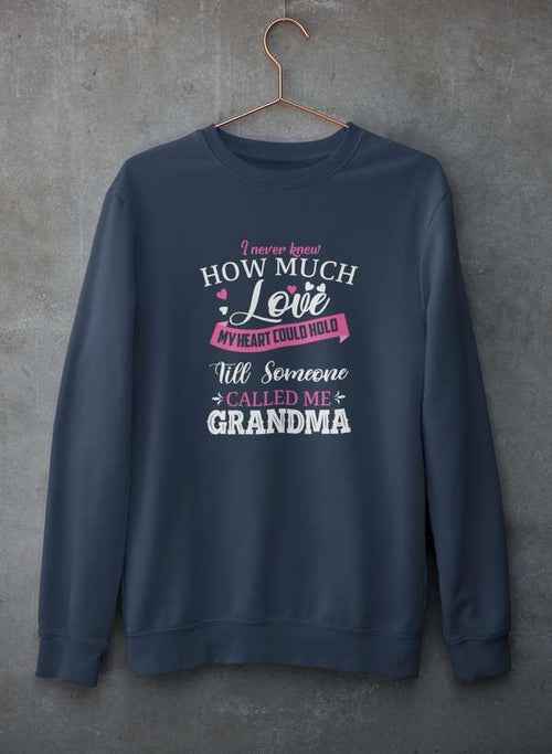 Gray crewneck sweatshirt displaying the quote: 'I Never Knew How Much Love My Heart Could Hold Till Someone Called Me'.