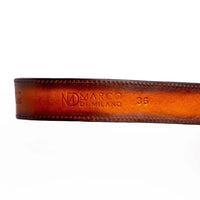 Detailed view of custom center-stitched leather channel on the Montana Belt, showcasing craftsmanship.