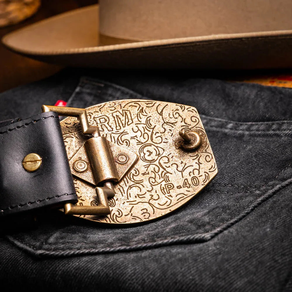 Casual outfit featuring Montana belt in black leather with antique brass buckle worn with jeans.