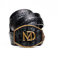 Close-up of black Montana belt showing caiman crocodile and calfskin leather texture with stitching.