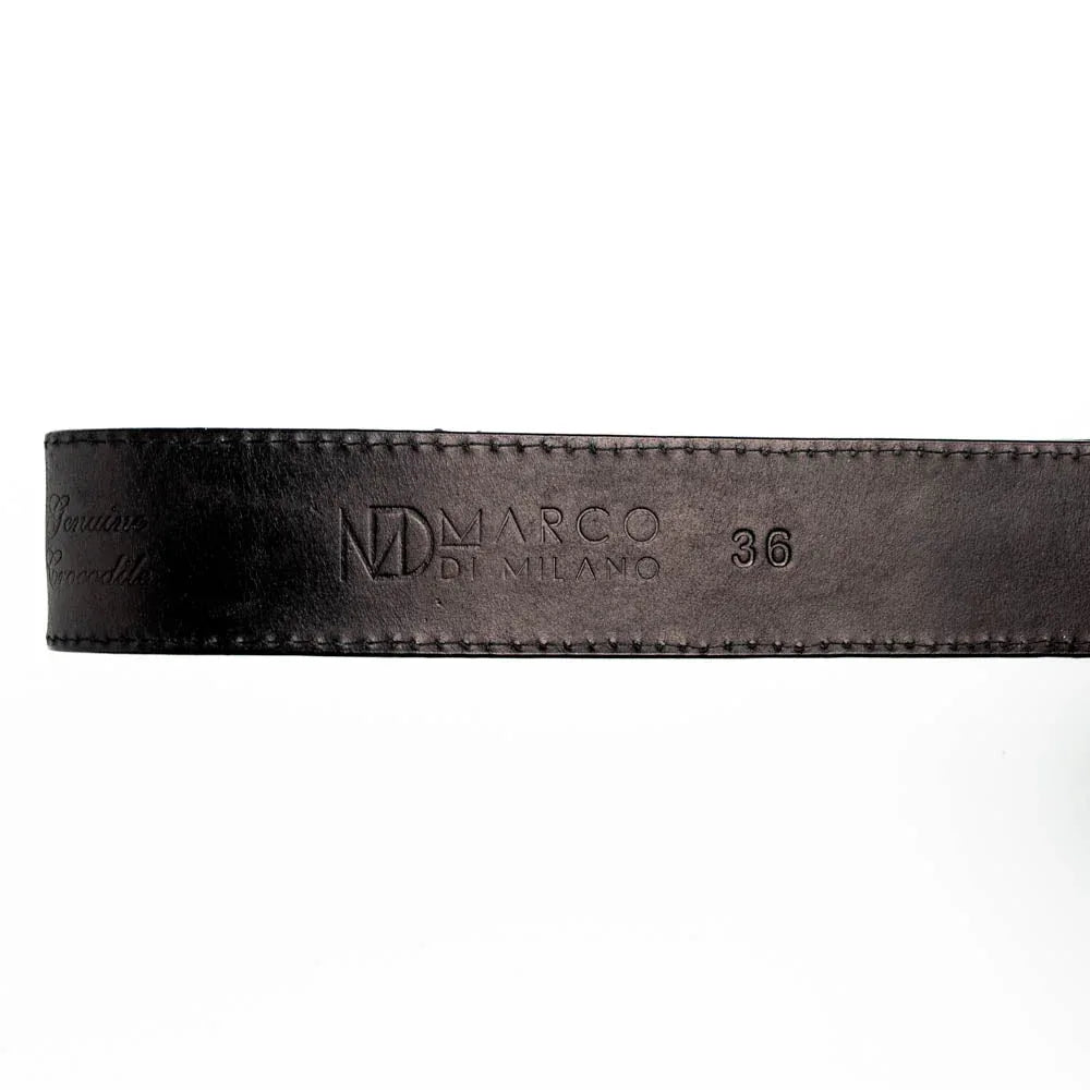 Montana belt’s antique brass buckle and matching tip on textured black leather belt.