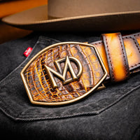 Close shot of Montana Belt fastening around waist, showing hand-stitched detail and leather finish.