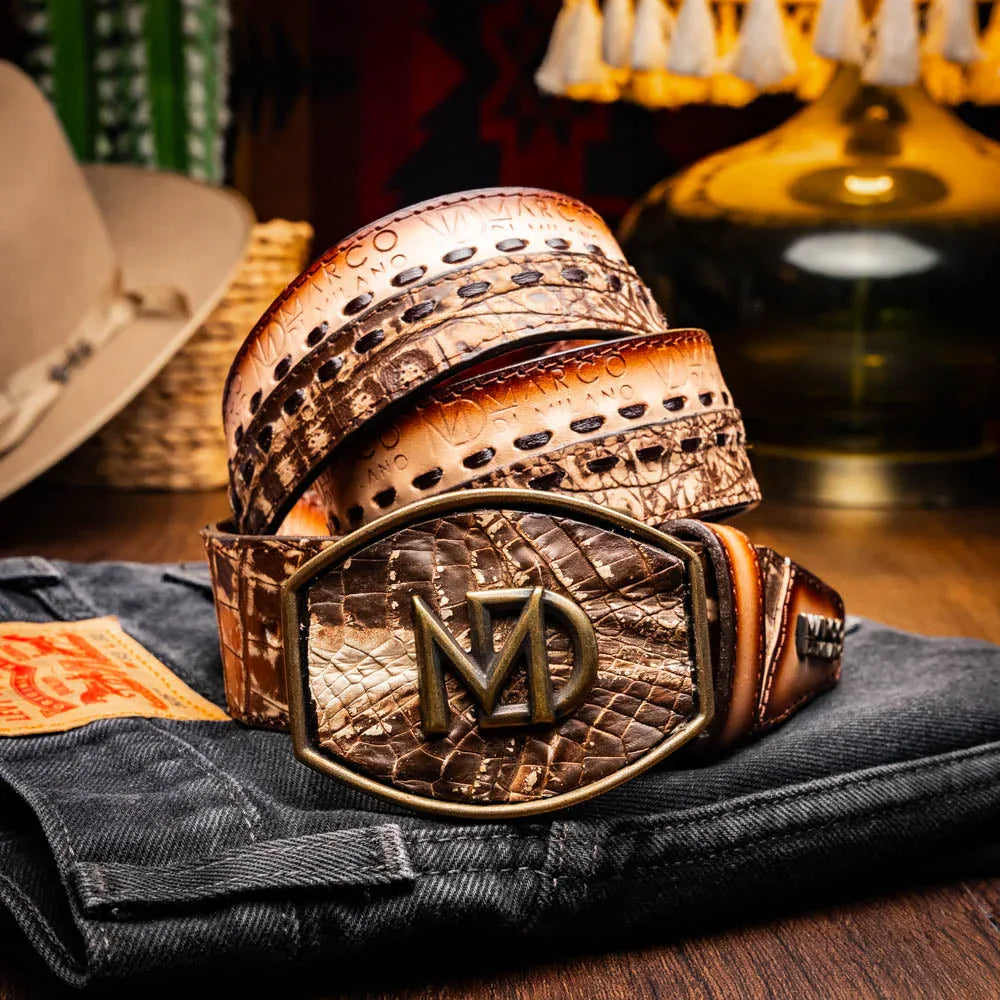 Lifestyle shot of person wearing Montana stone brown caiman crocodile and calfskin belt with jeans